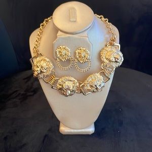 Brand new Lion choker and earring set; up to 17 inches long….adjustable